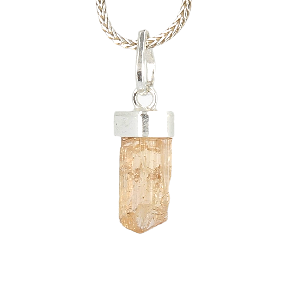 Pendentif topaze impériale brute